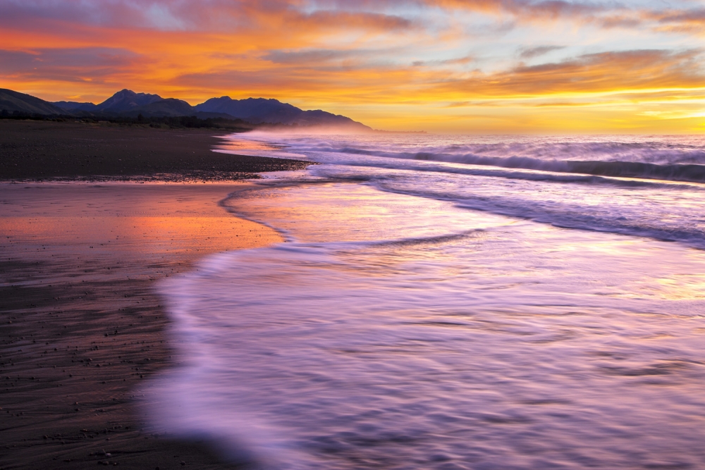 Colorful sunrise over new Zealand coast