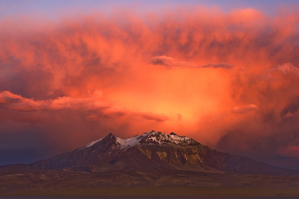 Volcano Cerro Colchane (Bolivia) at sunset